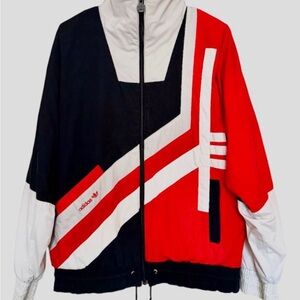 Vintage Adidas Zip Up Jacket
No size tag but it fits like a adult L